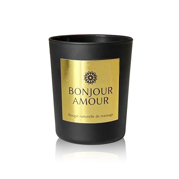 Bougie de Massage Bonjour Amour Melchior & Balthazar, en cire naturelle, fondant en huile tiède pour un massage doux et parfumé.
