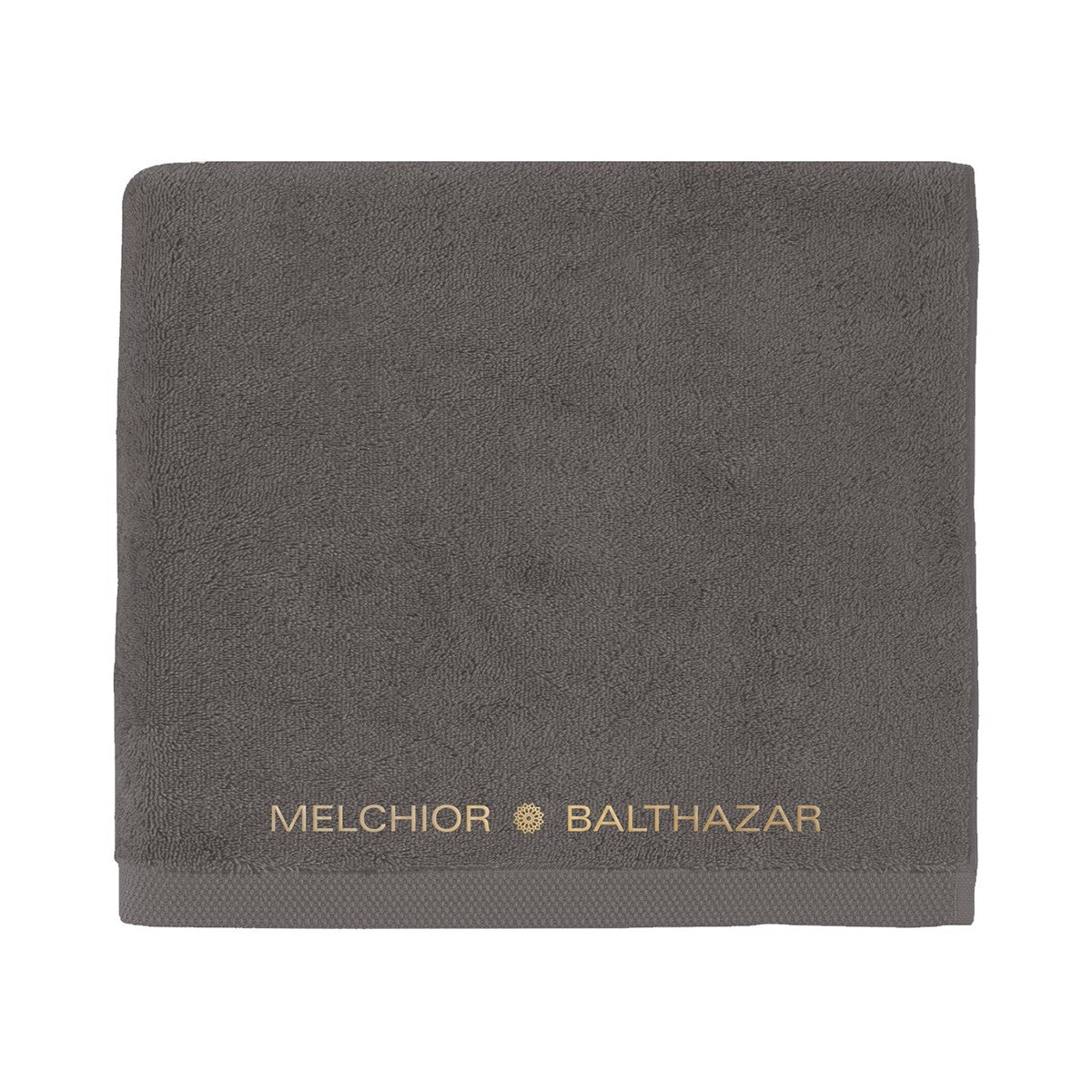 Serviette de bain brodée Melchior & Balthazar en coton 580 g/m², douce et élégante.